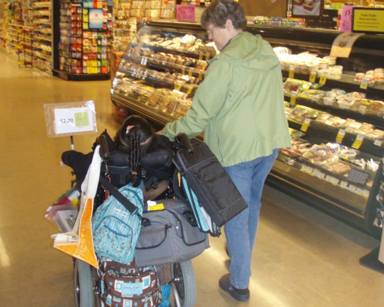 Miranda walking with Suzanne in store.