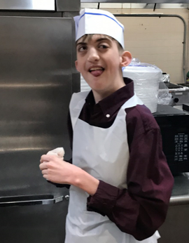 Jacob at work in the kitchen.
